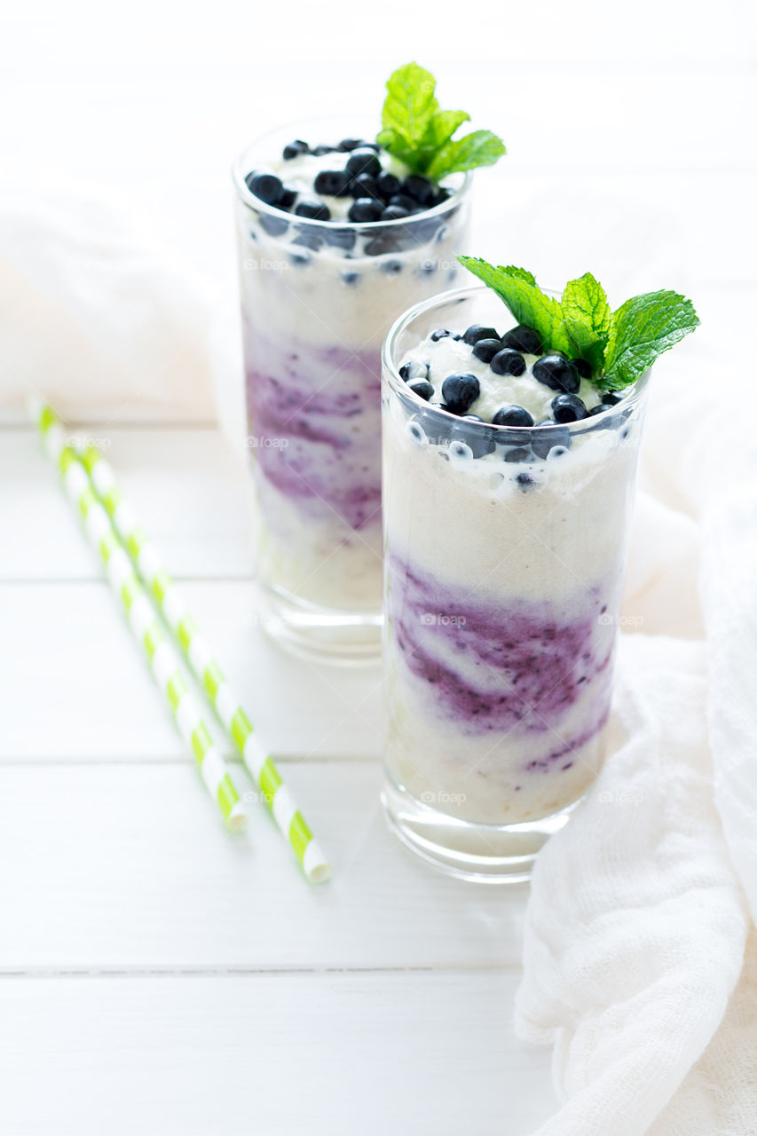 Blueberry smoothies in a tall glass