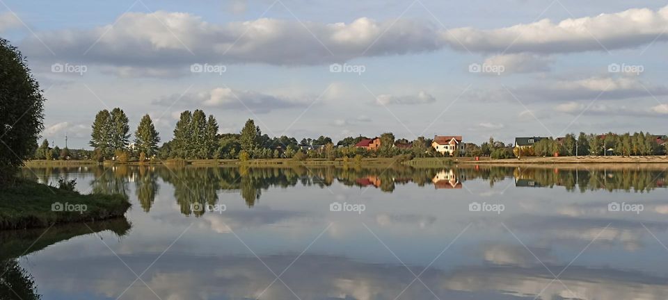 beautiful nature landscape clouds and reflection on a lake