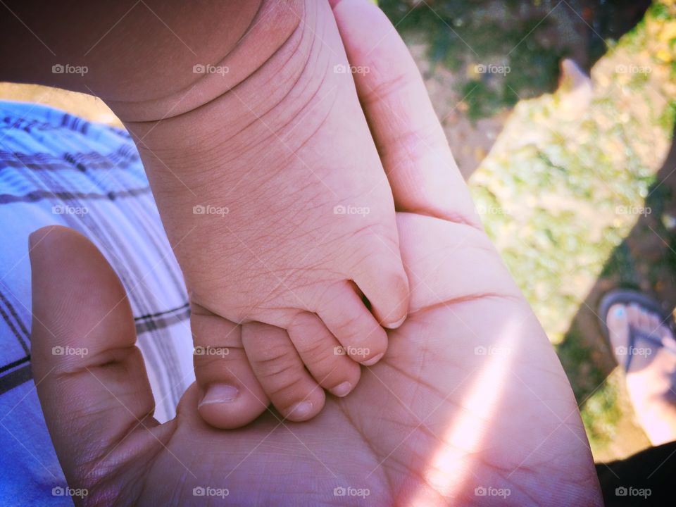 Baby's foot in Mothers hand