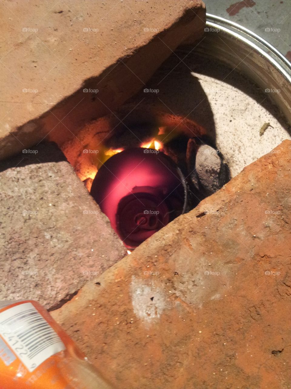 Melting aluminum cans into ingots
