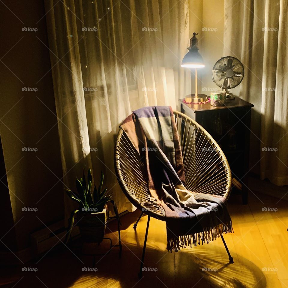 My relaxation area; I love taking the opportunity to read for hours sitting in this beautiful chair that is so comfortable!