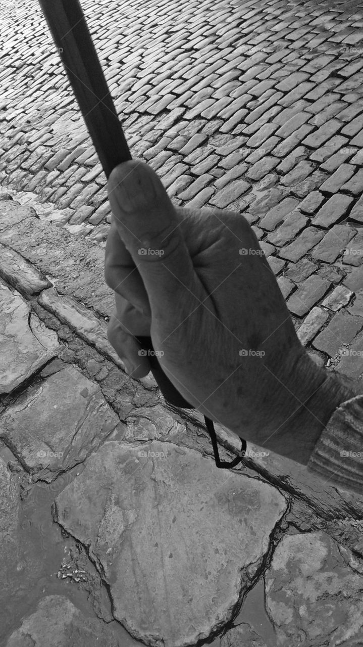 Raining. Ouro Preto city. The author's hand.