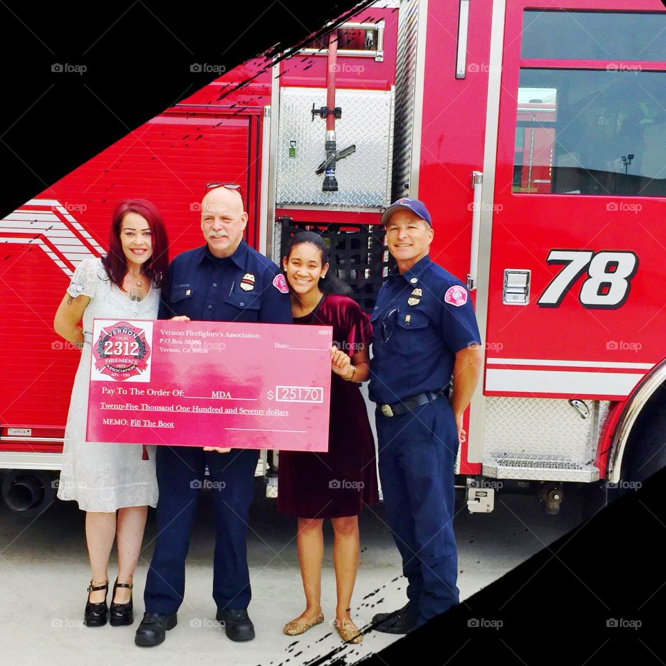 Firefighters giving us a really big check