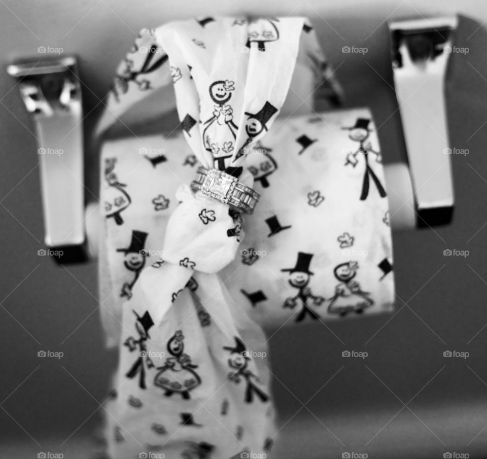 A pre wedding ring photo,with funny illustrations on it in black and white