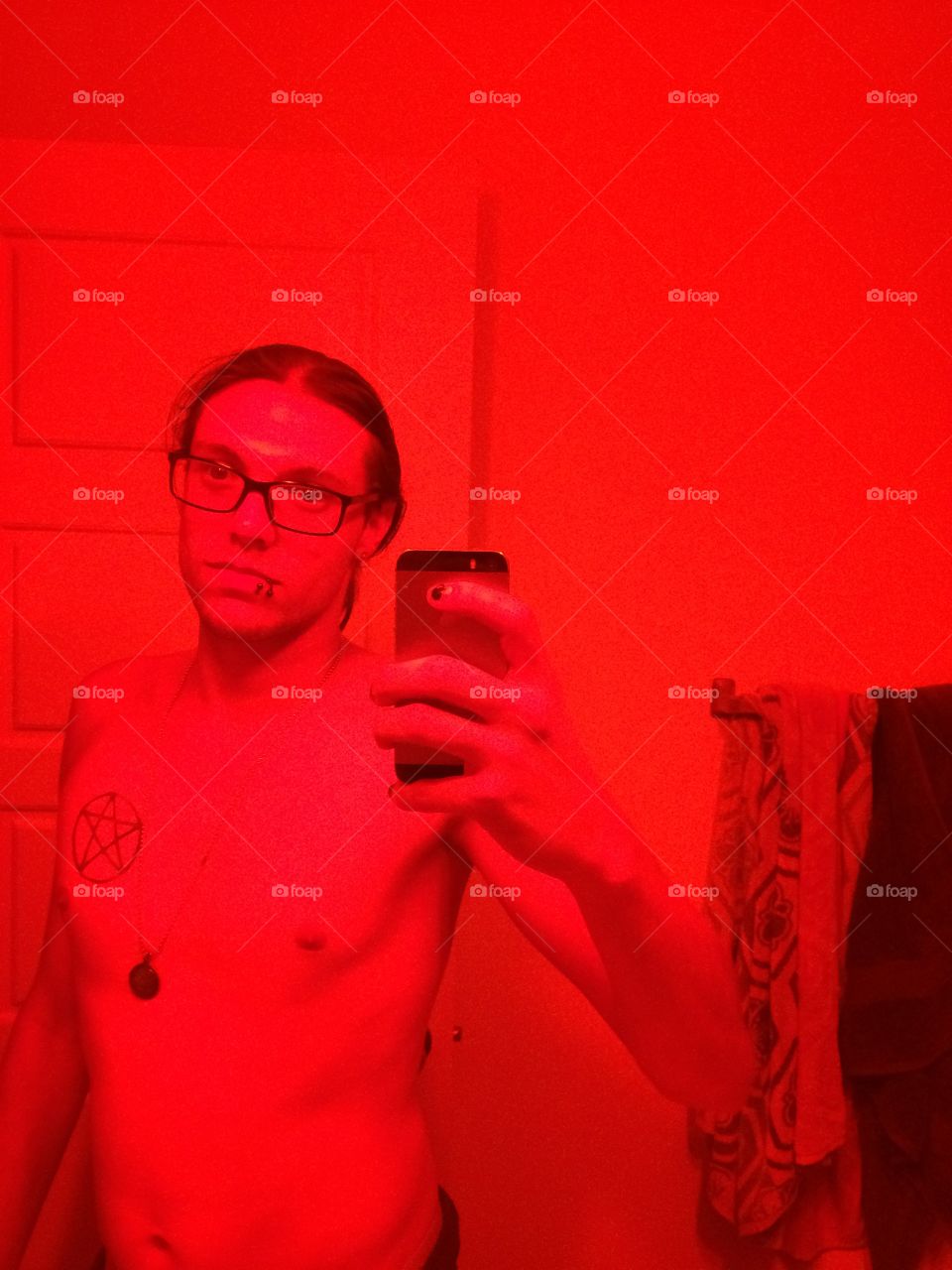 No filter, just 2 red light bulbs in my bathroom, It definitely feels like a room for developing photographs!