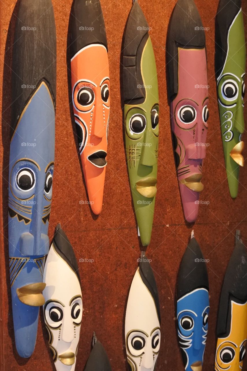 Africa masks . Hanging in a market in Africa 