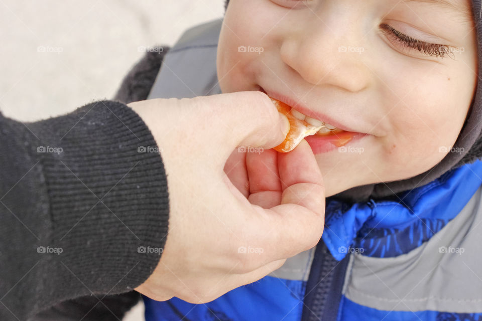 Eating tangerine