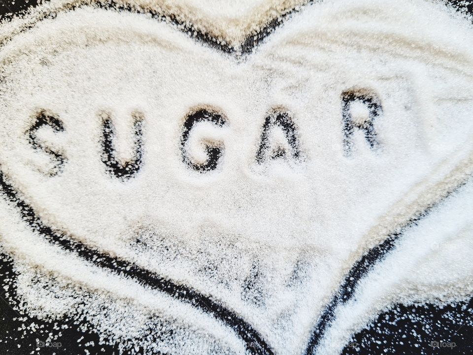 written sugar with sugar