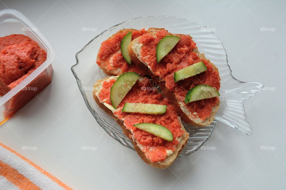 sandwiches with red fish and cucumber