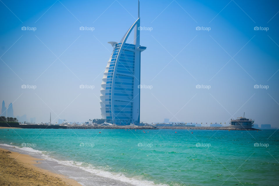 DUBAI, UAE United Arab Emirates - 23 APRIL 2016: Burj Al Arab hotel, also called "The world's only 7 star Hotel" or "Tower of the Arabs" 321 meters height high-rise, luxurious symbol of modern Dubai.