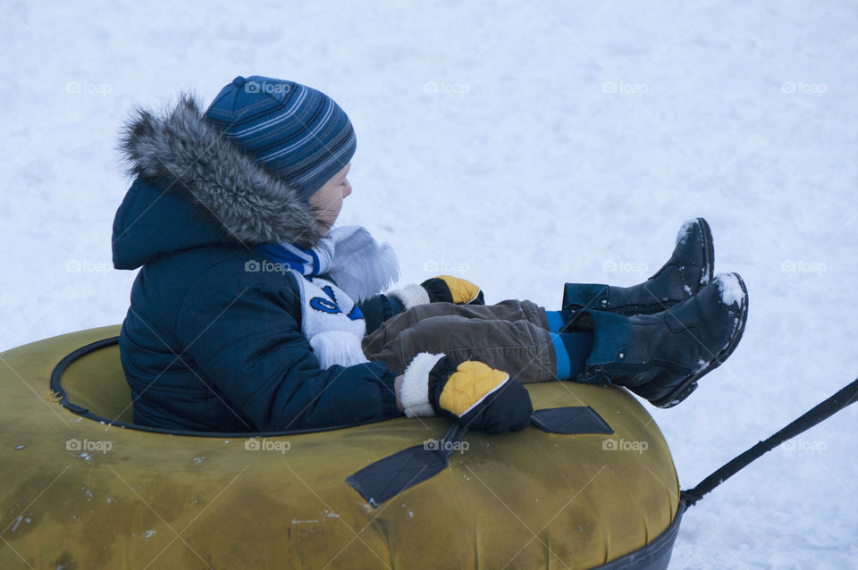 the winter vacation. riding tubing