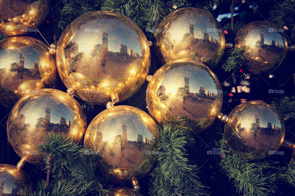 Bright christmas decorations on fir tree in Moscow, Russia