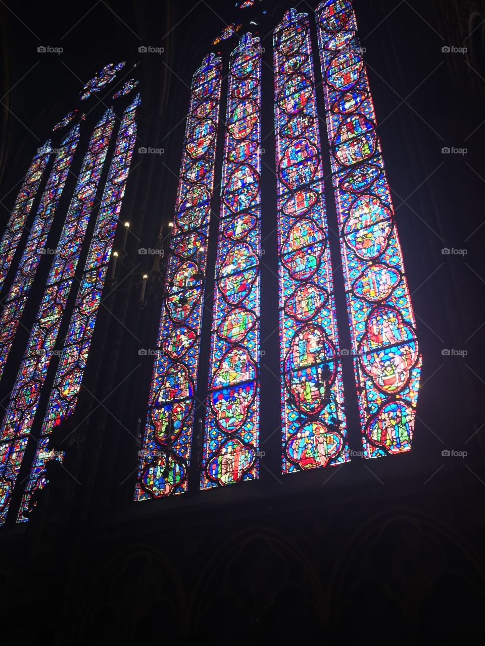Colorful stained glass windows inside Sainte Chapelle Paris France 