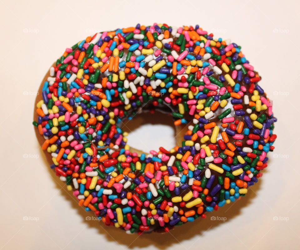 Brightly colored sprinkle donut