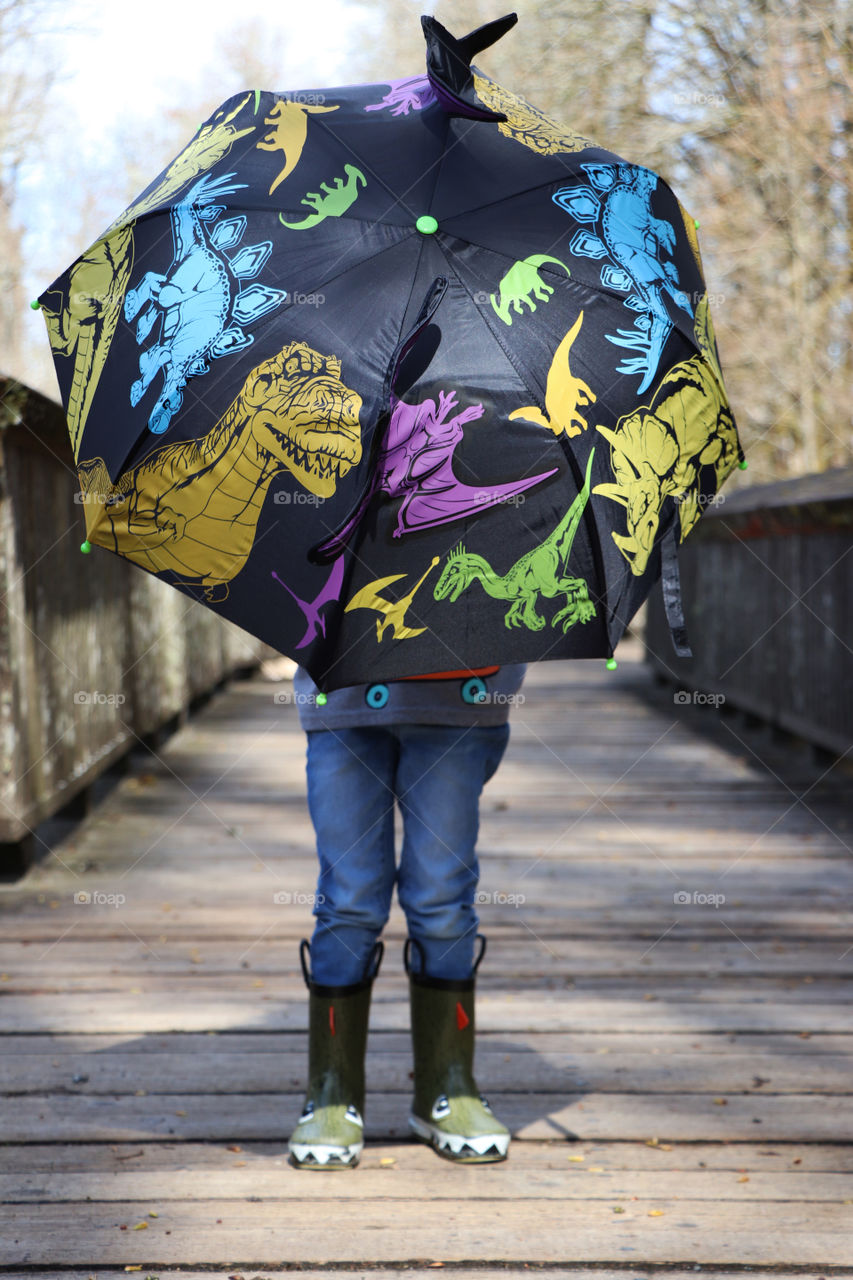 child with umbrella