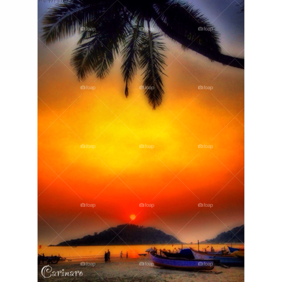 goa beach sky people by carinaro