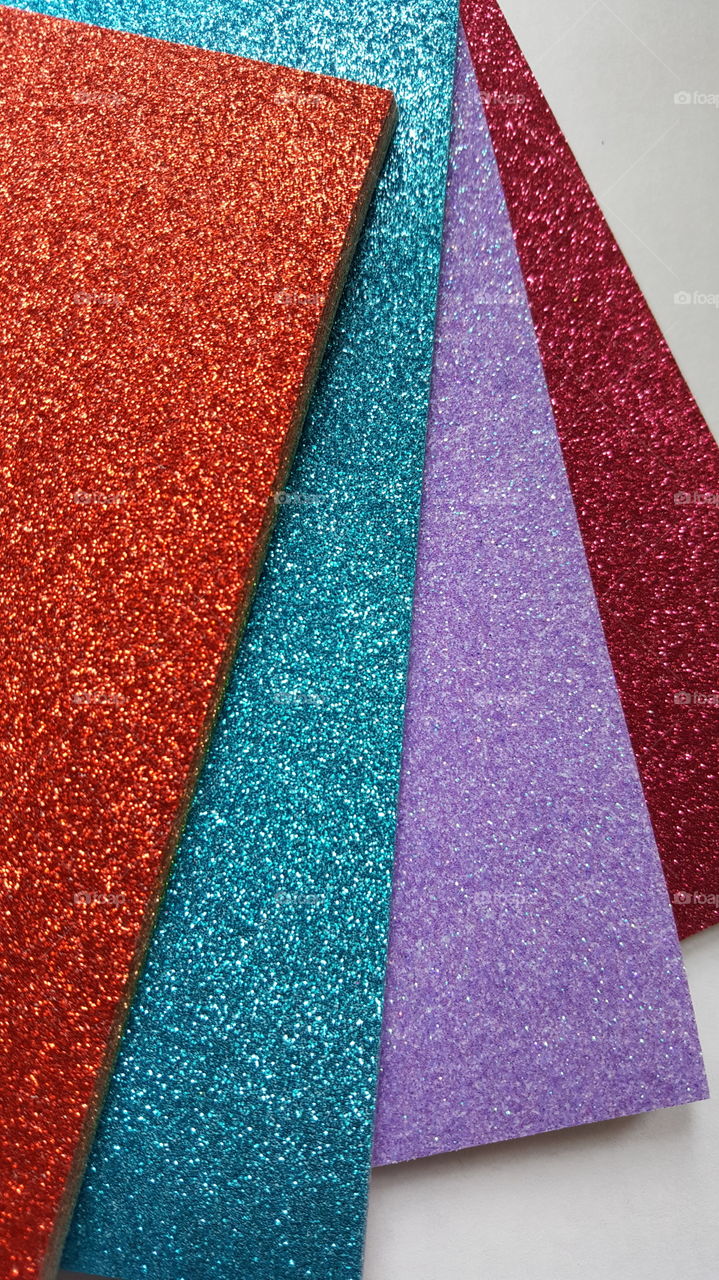 Rainbow colored glittery craft paper