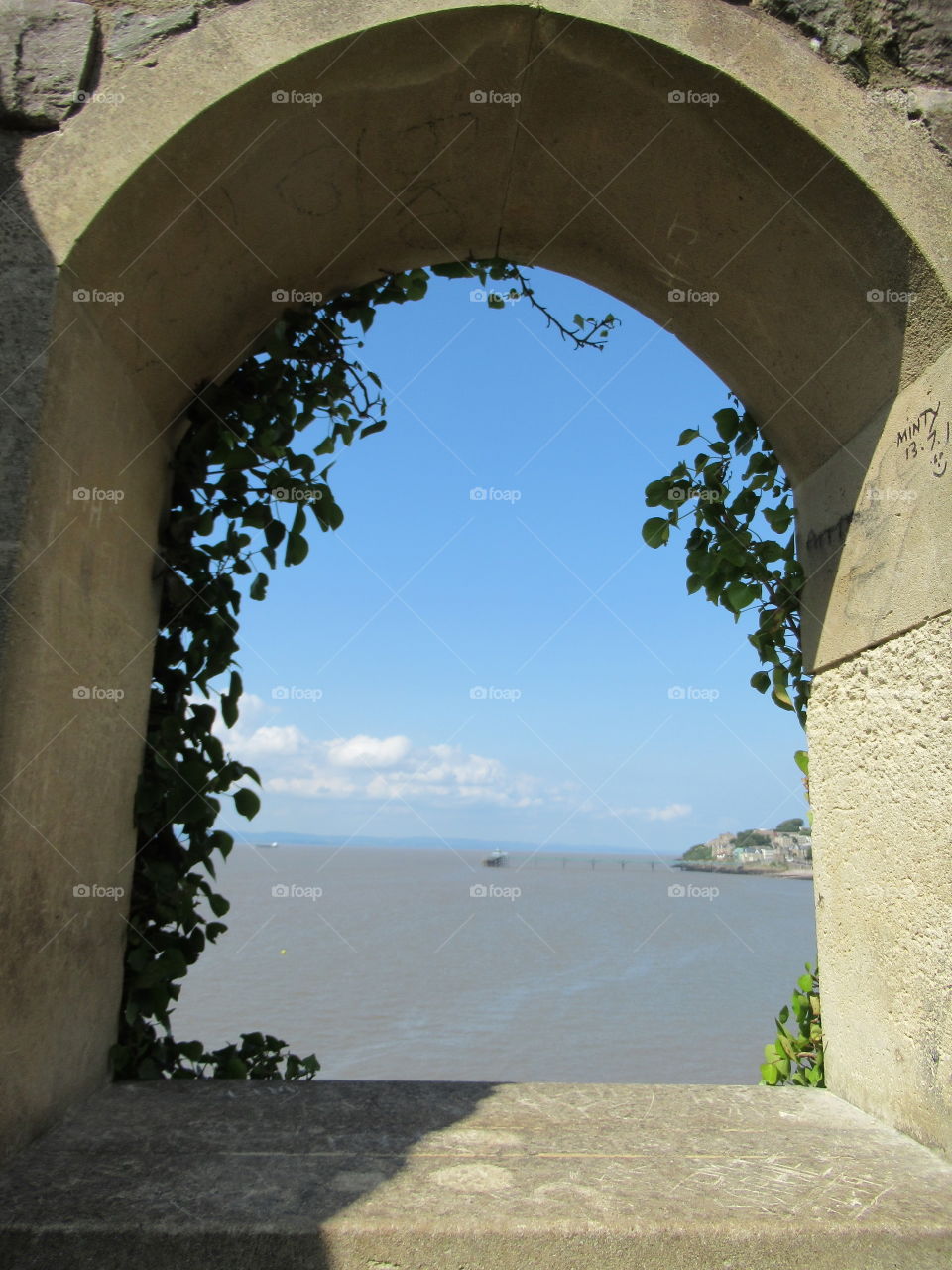 Sea view looking through archway