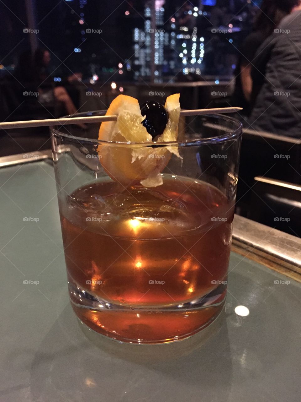 Old fashioned drink at a rooftop bar 
