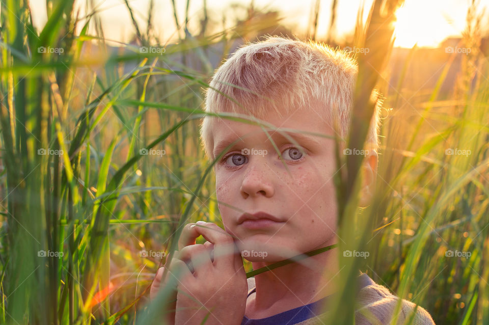 Portrait of the boy in the cane