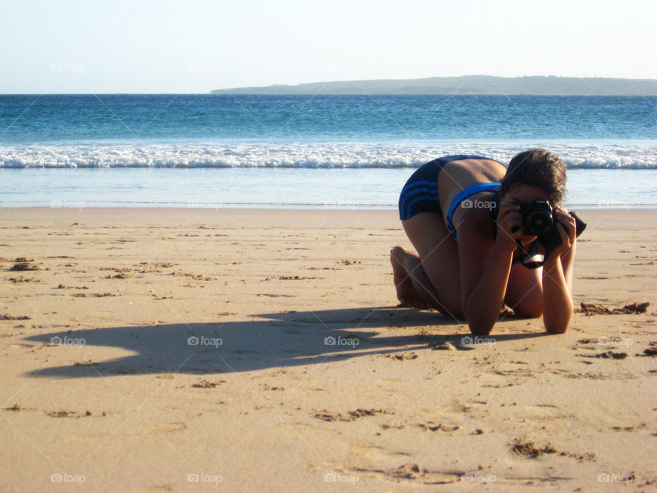 Taking pictures on the beach