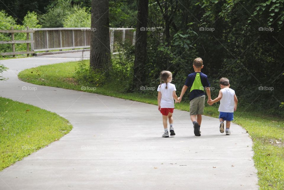 Walking Together . Siblings getting along!!