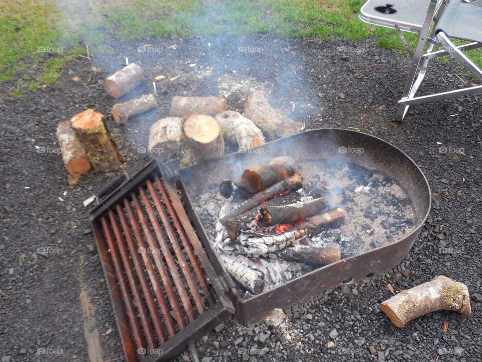 Daytime Campground Campfire Burning, Camping and Cooking Outdoors