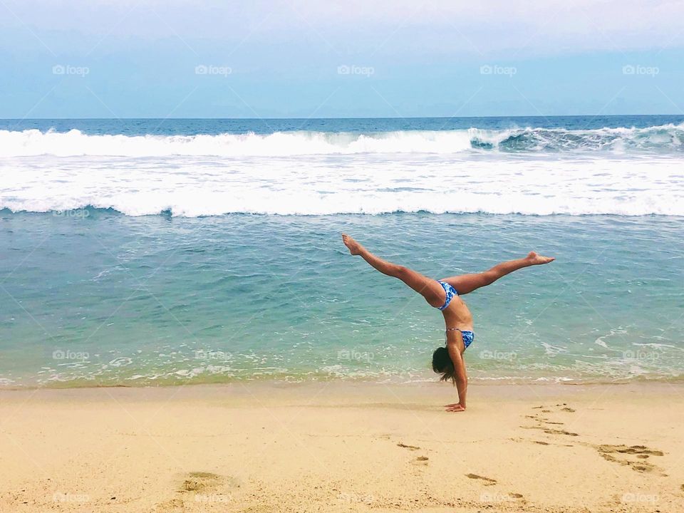 Handstand at the beach 