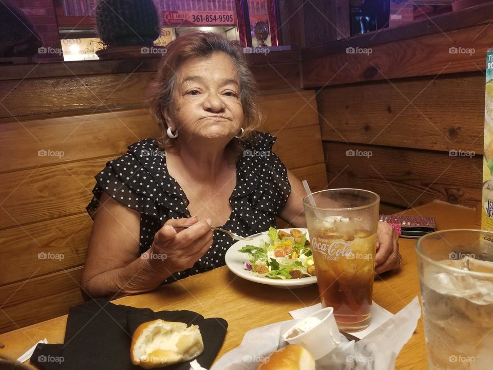 old lady Enjoyin a salad