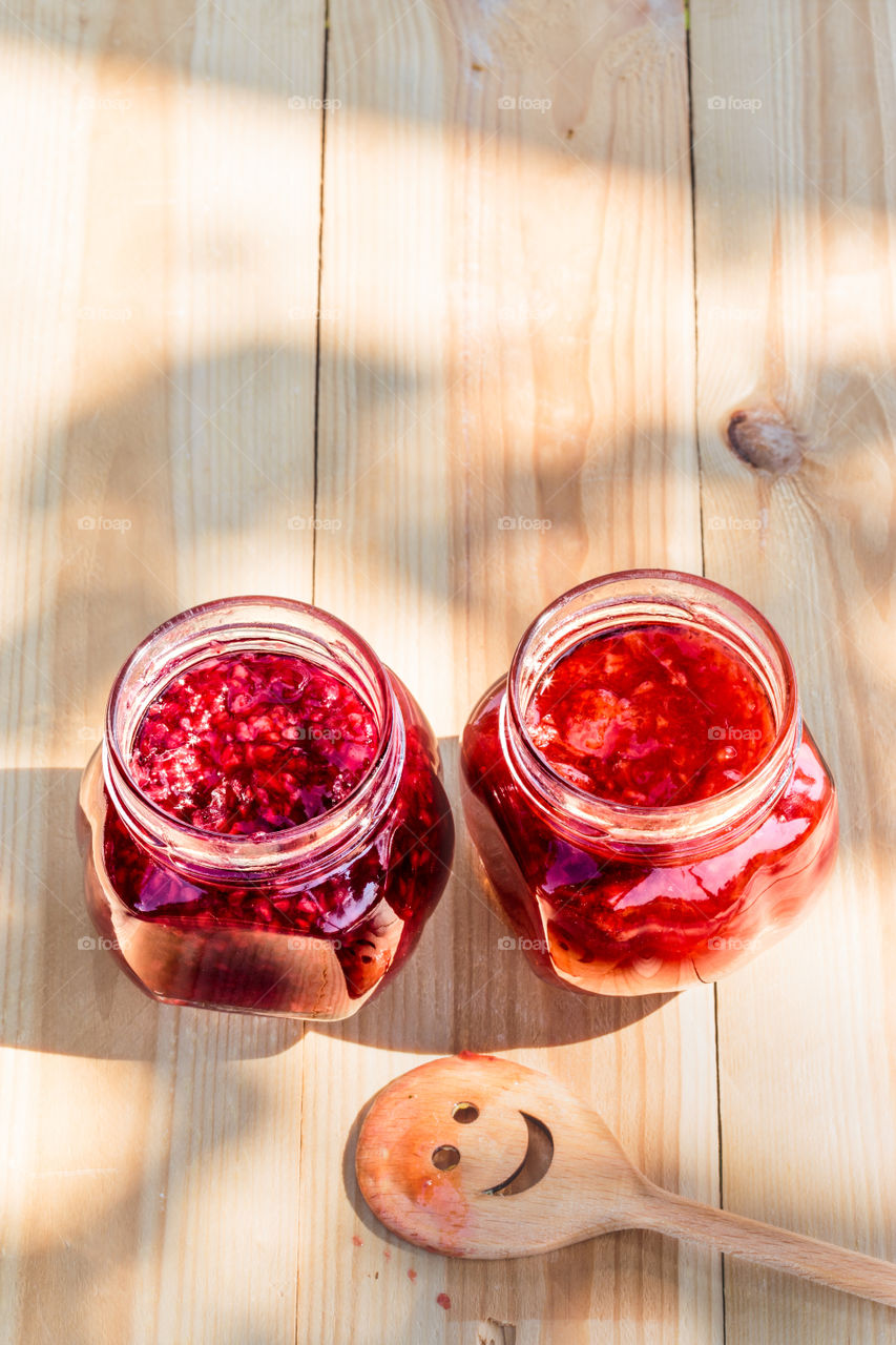 Homemade jam on wooden table. Homemade jam on wooden table