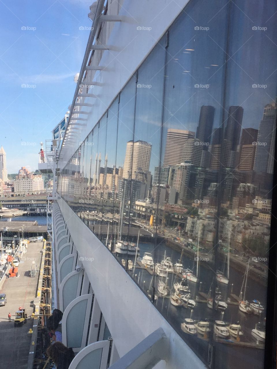 Seattle reflected in cruise ship windows