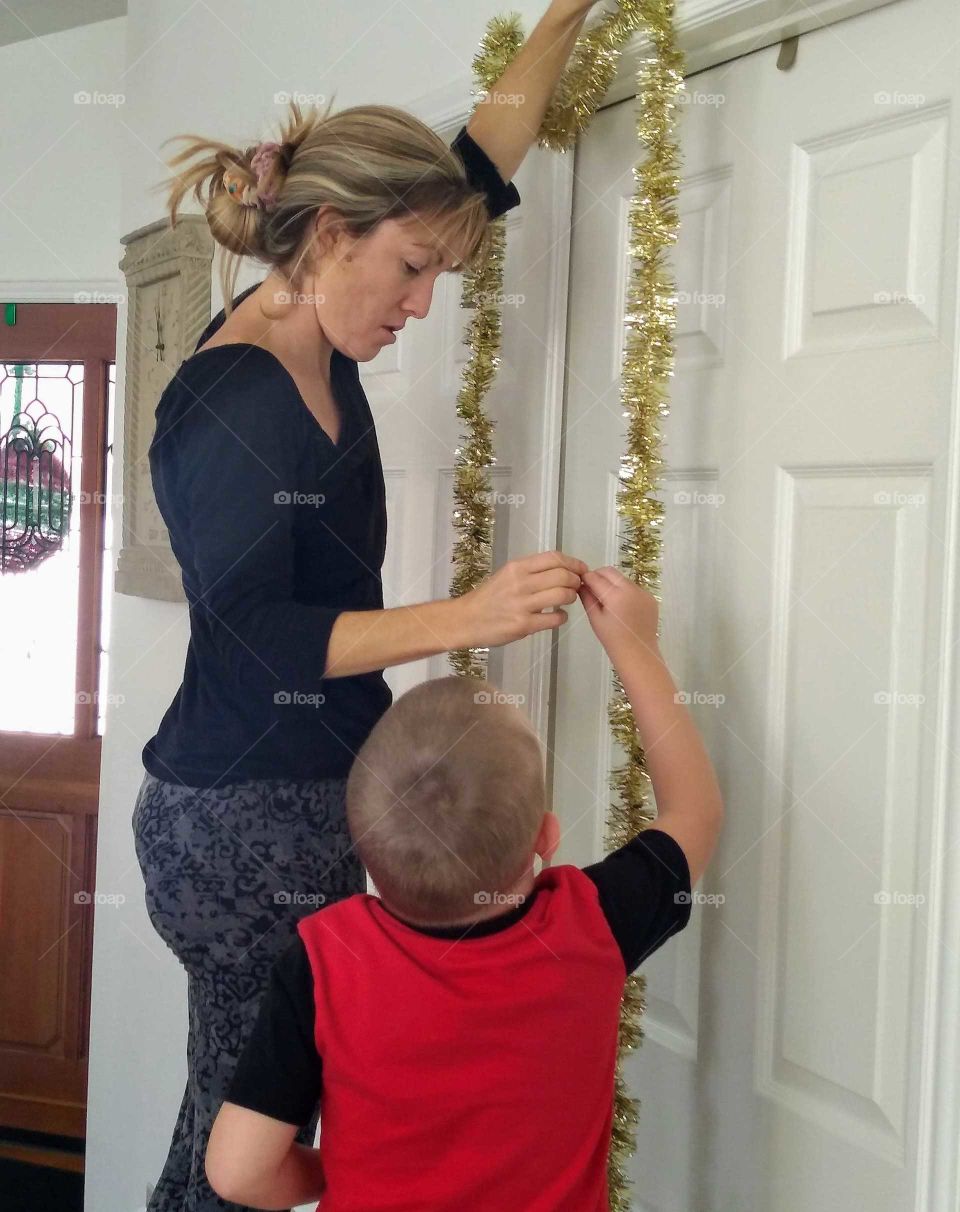 spending time with family helping decorate for Christmas