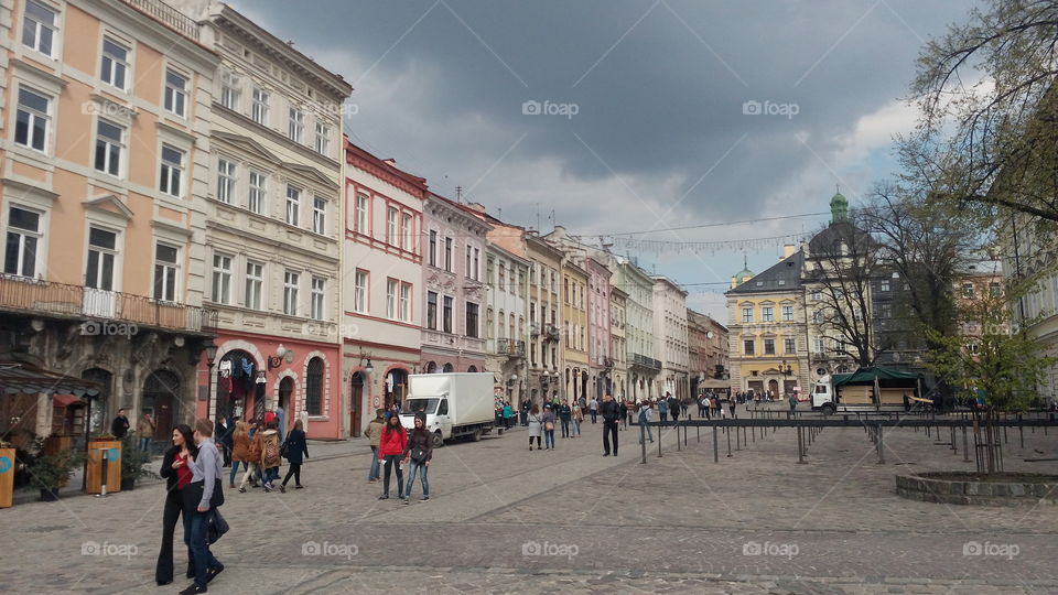 Lviv bazar main square, UNESCO, people, cafe and shops