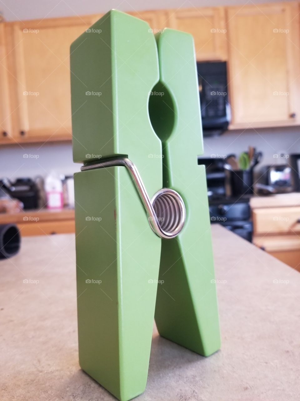 giant green laundry clip