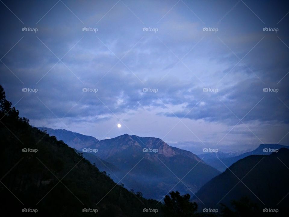 moon rise over mountain