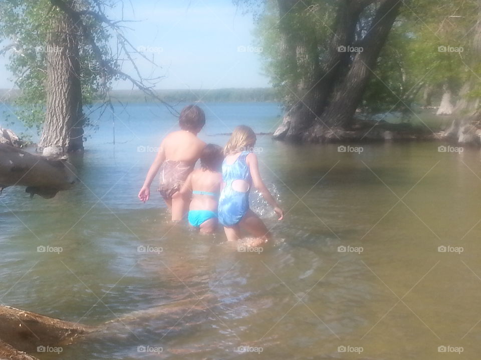 lake. playing with family