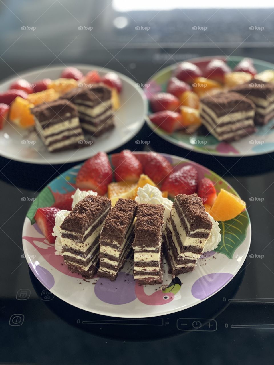 chocolate cake, honey cake, cake with white cream and fruit, fruit on a plate, dessert,