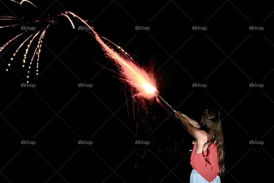 Girl and fireworks 