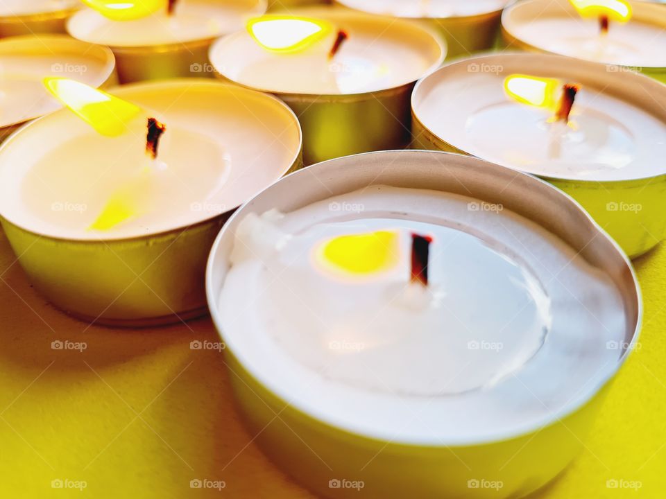 detail of some lit tealights