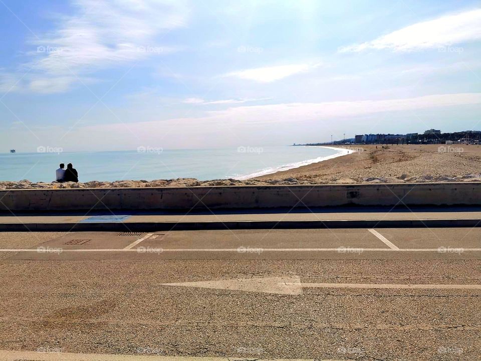 View of the seashore where lovers sit