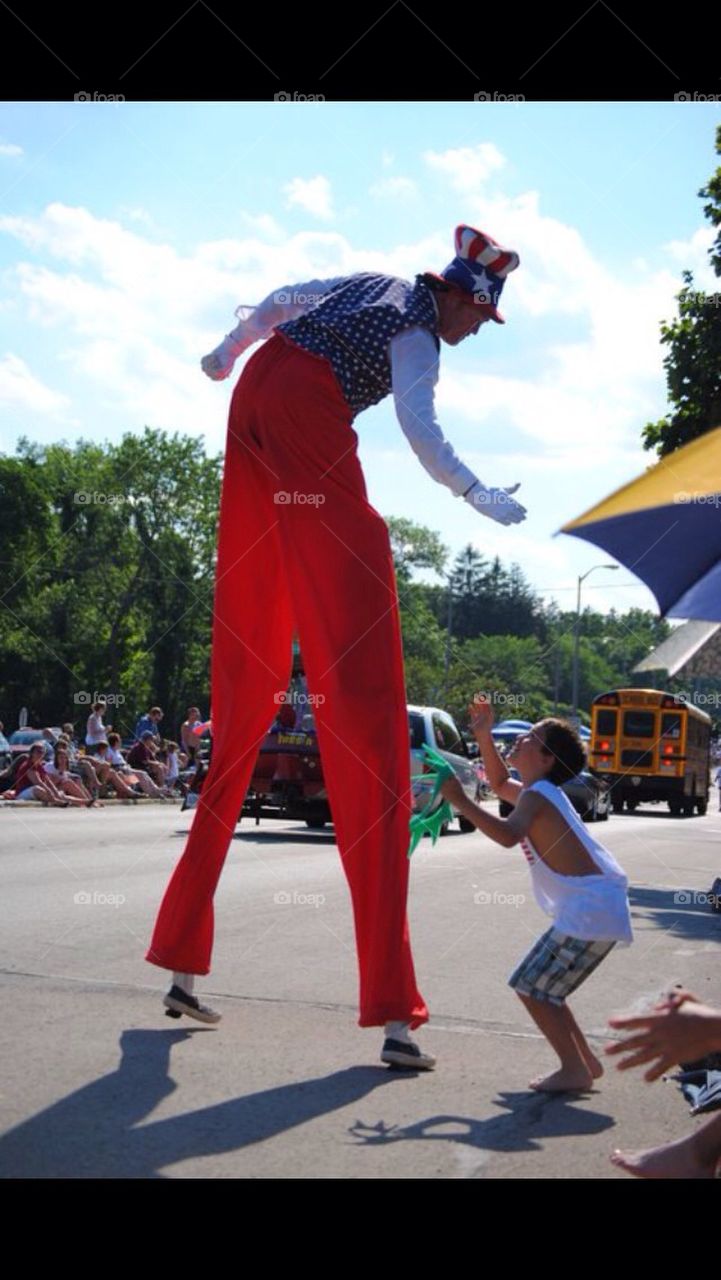 4th of July Parade man on stilts