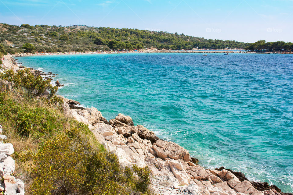 Scenic view of a sea against clear sky