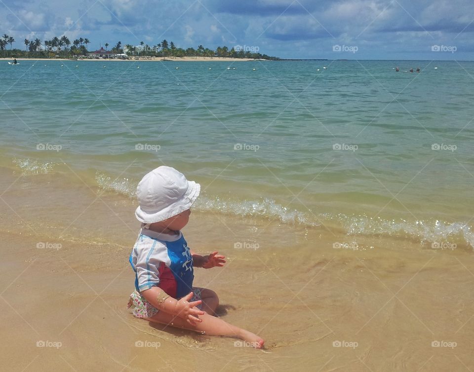 crawling on the sand near sea