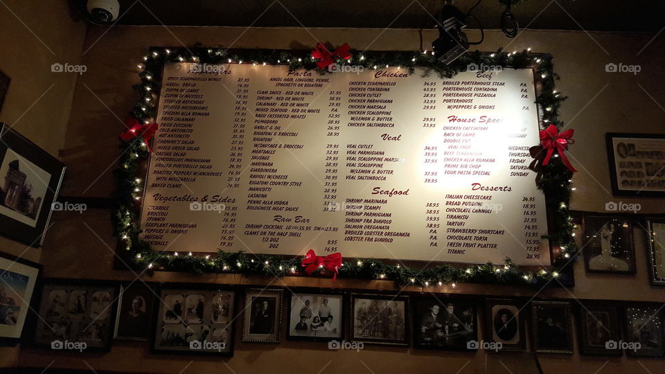 Carmine's menu. menu on wall at NYC restaurant