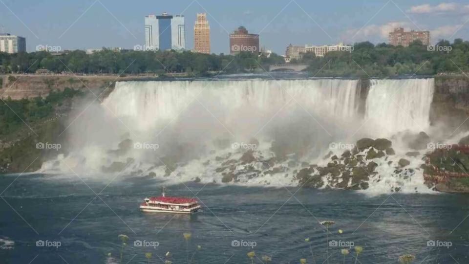 Boat  in front of Niagara falls American side 