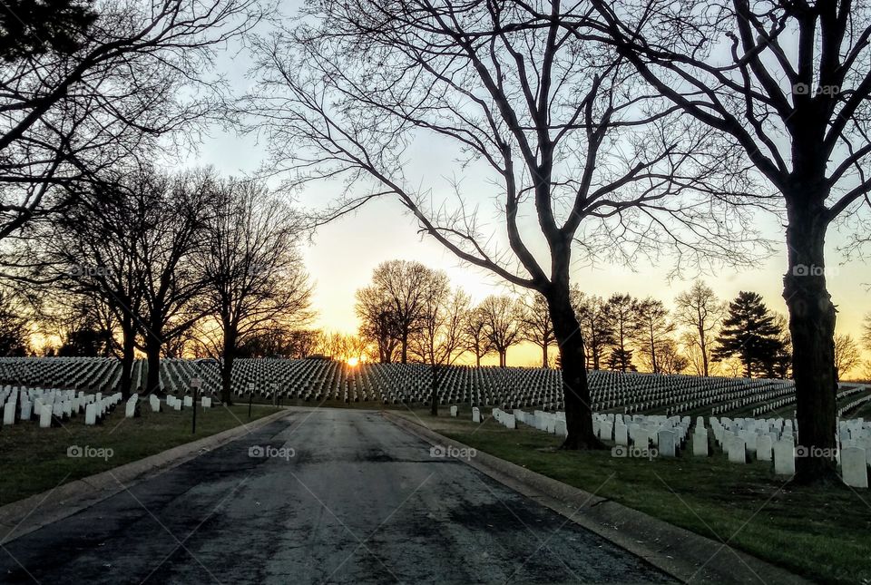 military cemetery at sunset