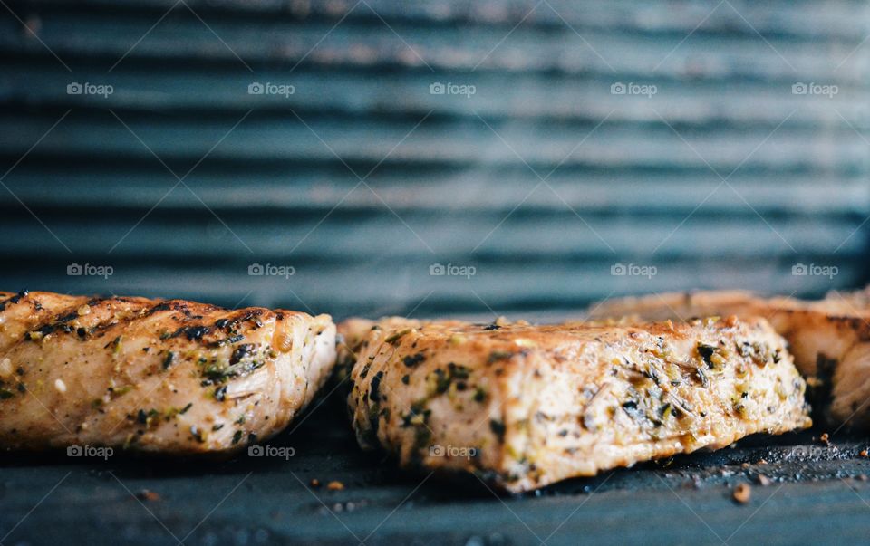 Cooking food on grill