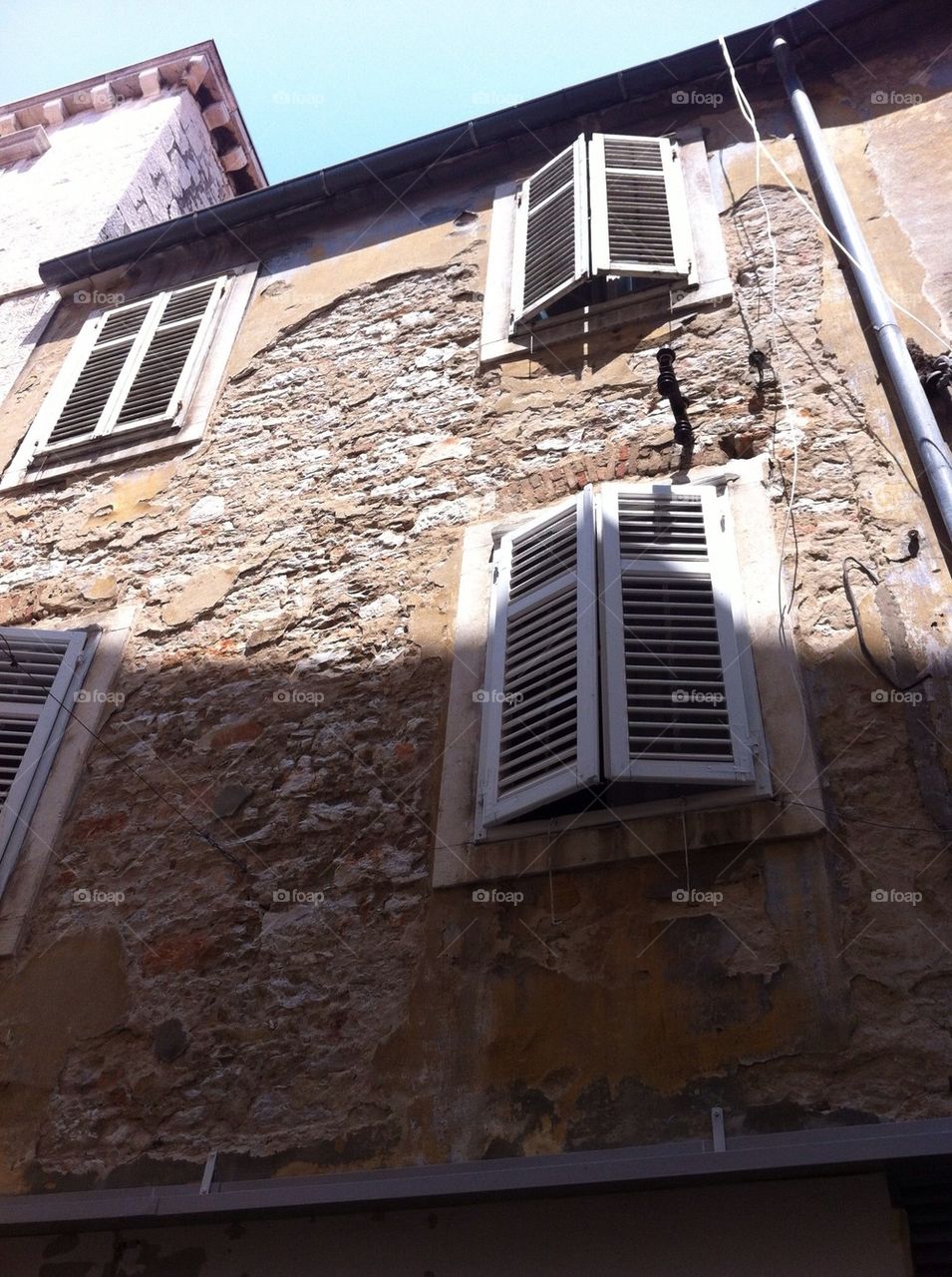housewall with white shutters