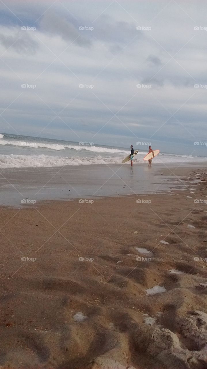 surfers. Beach