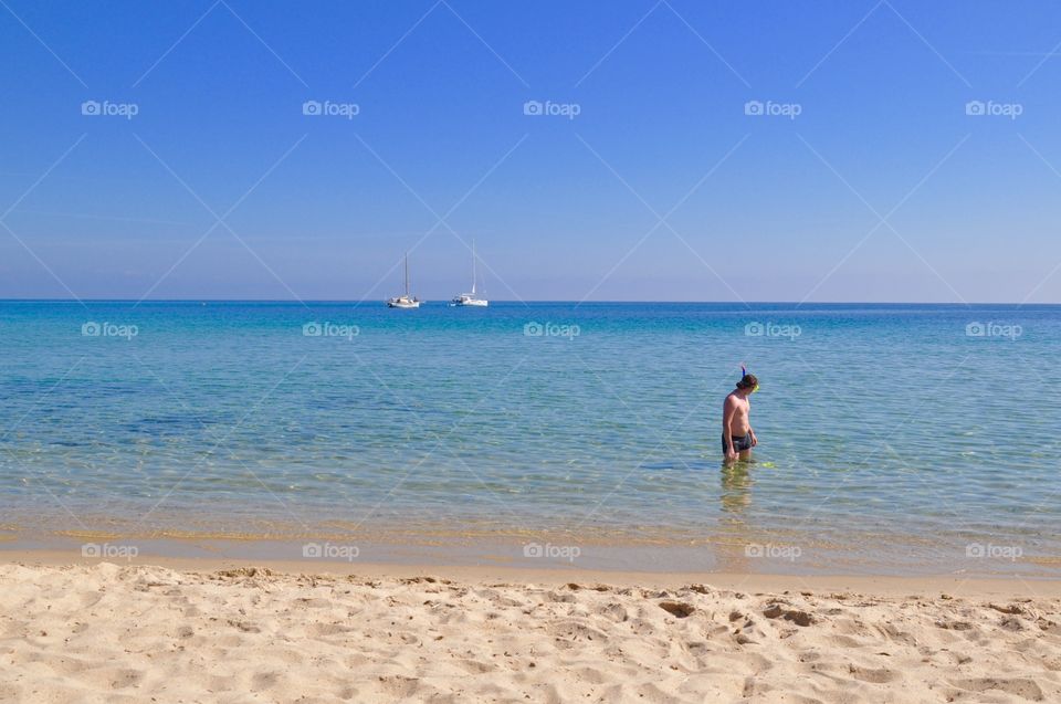 Snorkeling on Mediterranean Sea on Sardinia island Italy 